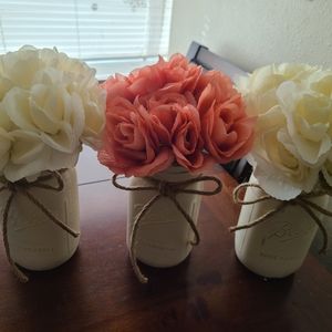 Set of three mason jars with fake rose flowers